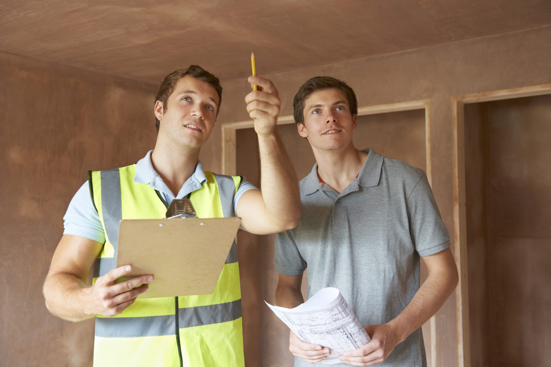 Picture of Home inspector talking with client